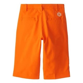 Puma Golf Tech junior pantalones cortos, naranja vibrante