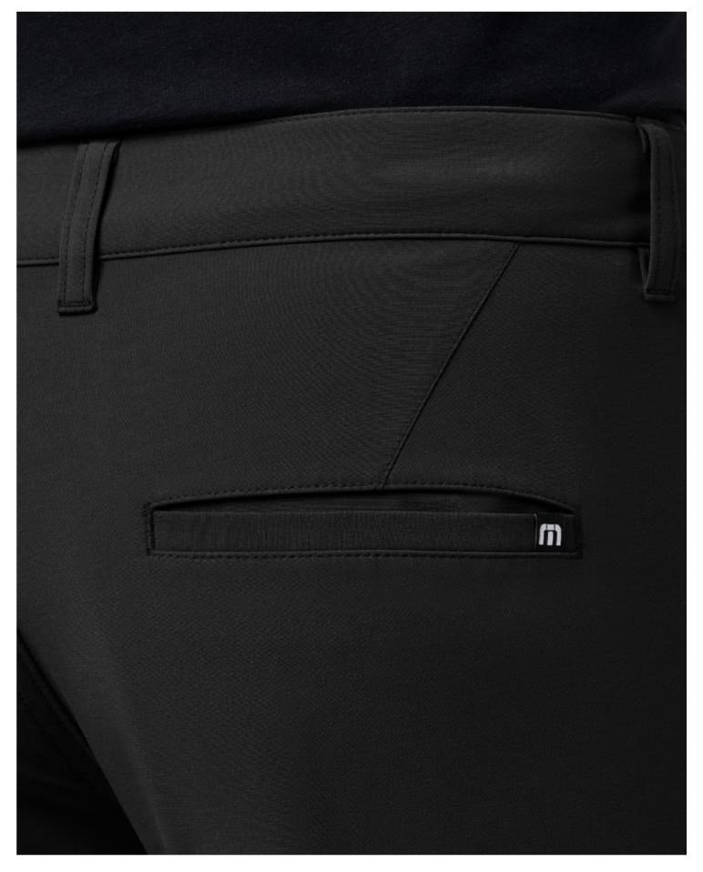 Travis Mathew Open To Close Tech Chino pantalones de hombre, negro