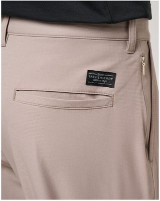 Travis Mathew Wanderlust pantalones de hombre, caqui