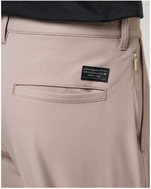 Travis Mathew Wanderlust pantalones de hombre, caqui