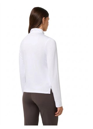 Travis Mathew Skyloft Light Zip longsleeve polo de mujer, blanco