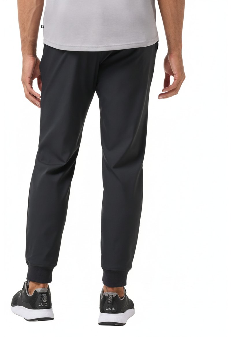 Travis Mathew Open To Close 2.0 Jogger pantalones de hombre, negro