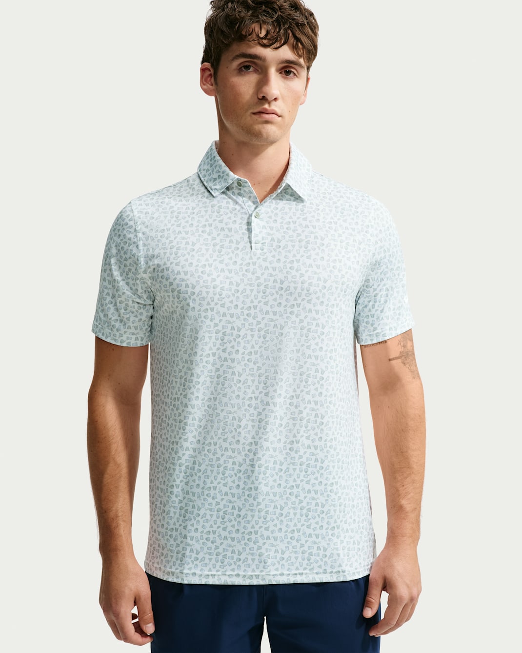 Polo de golf Nike Velocity Dri-FIT Micro-Print – Jade Horizon/White, Insignia de materiales reciclados