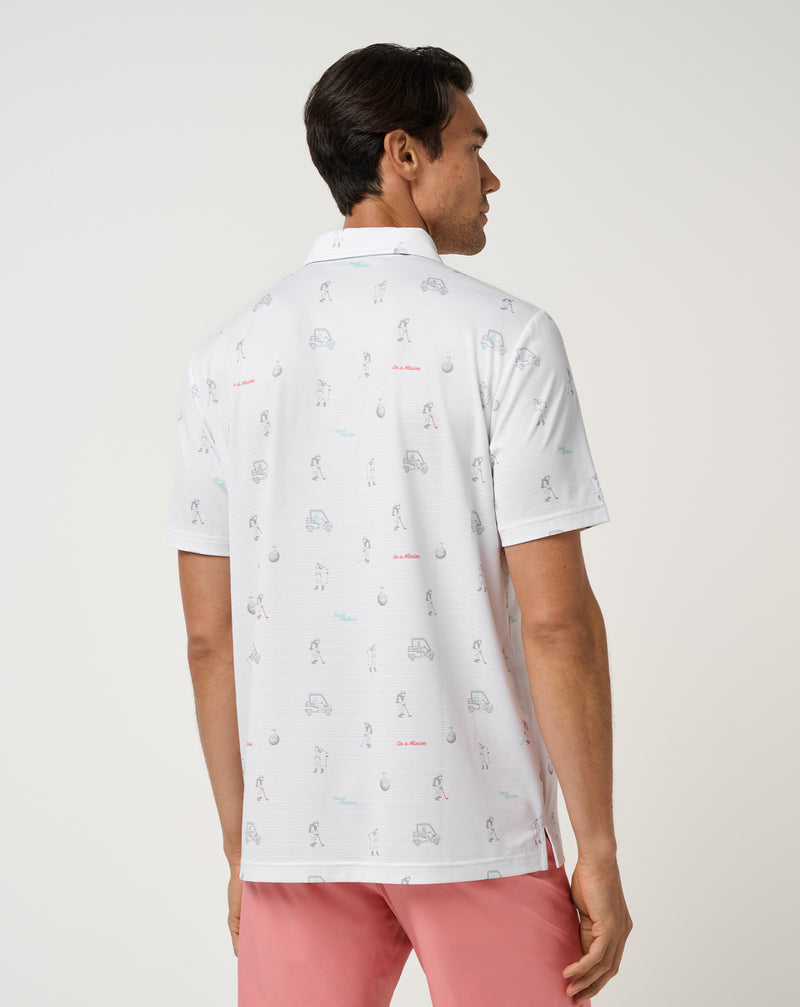 Travis Mathew On A Mission Polo – detalle de perforación a rayas y gráfico de astronauta