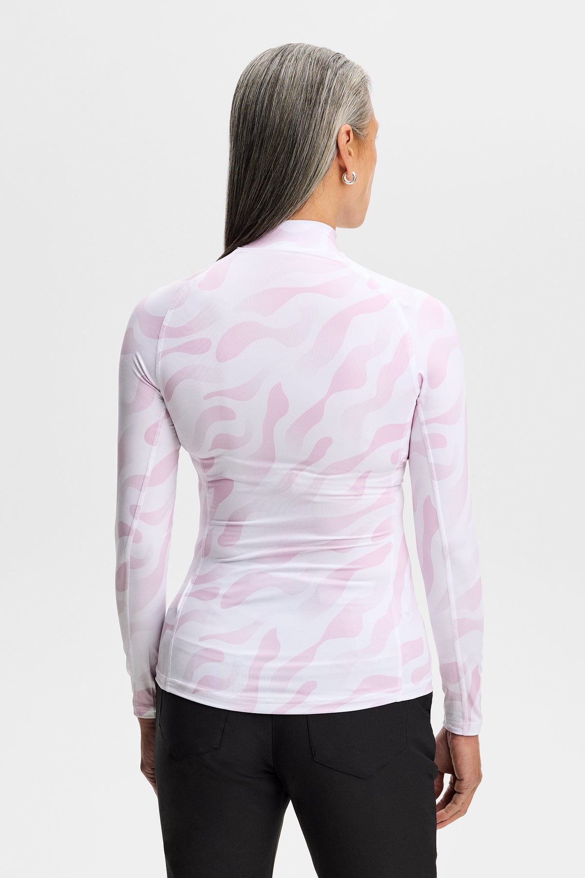 J.Lindeberg Ella Print Compression Top – detalle de absorción de humedad