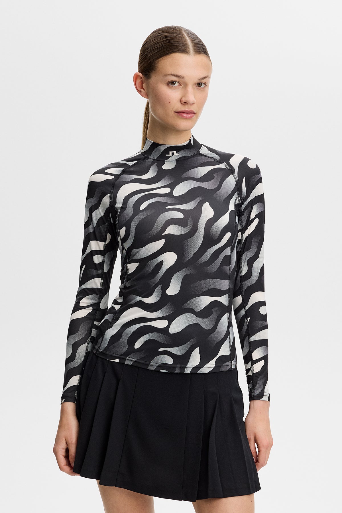 J.Lindeberg Ella Print Compression Top Bunker Fade Black Moonbeam - vista lateral en el campo